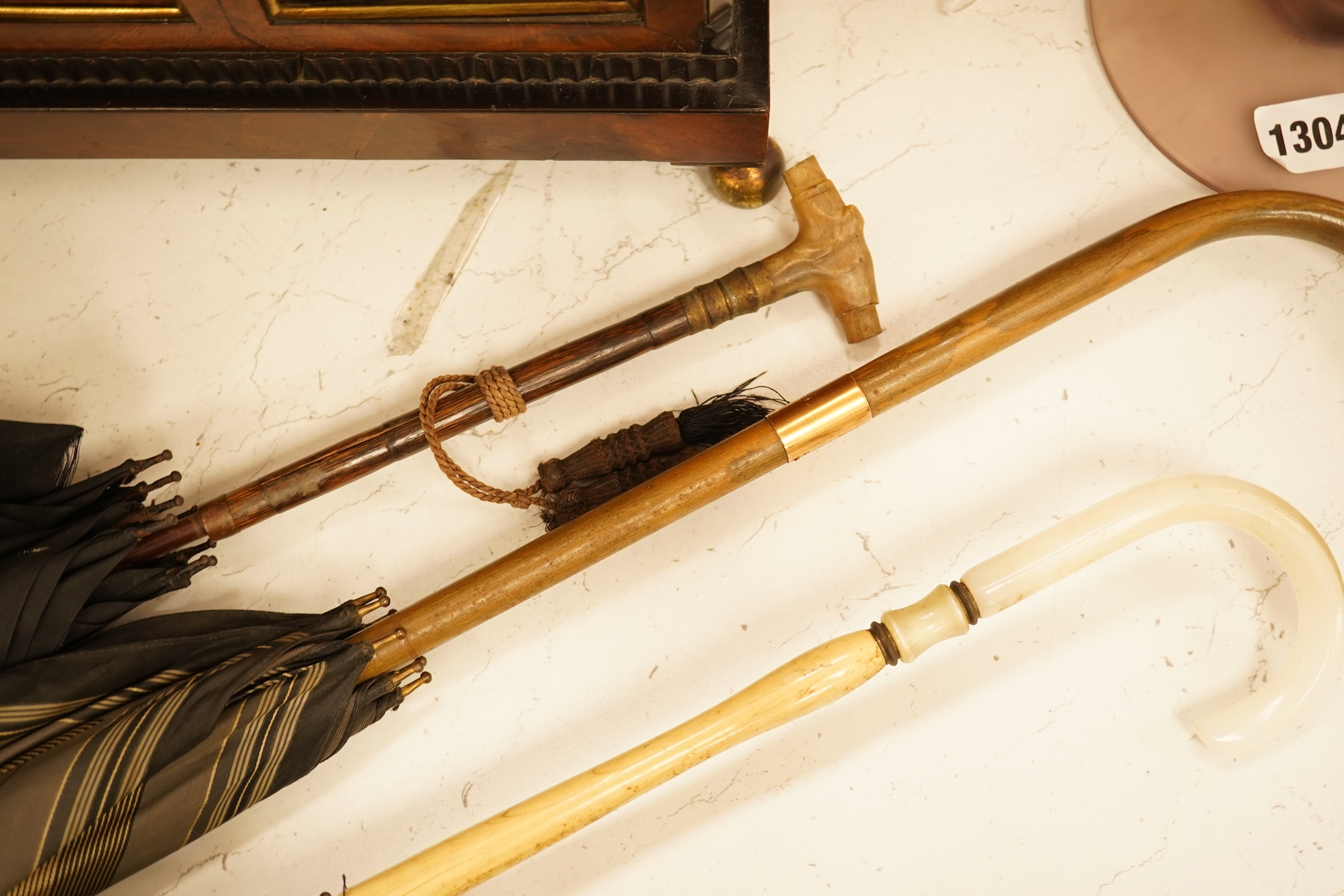 An early 20th century gold mounted Brigg of London silk parasol and two others